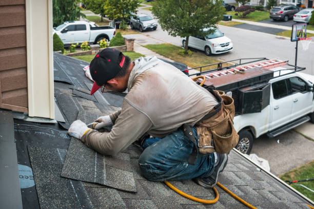 Professional Roofing technician working in Blissfield, OH